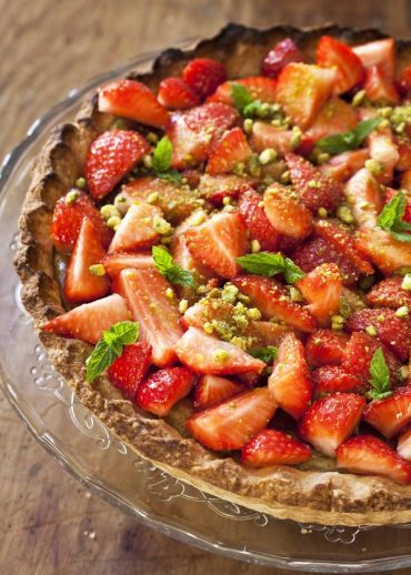 Recette de la tarte cheesecake aux fraises et aux pistaches