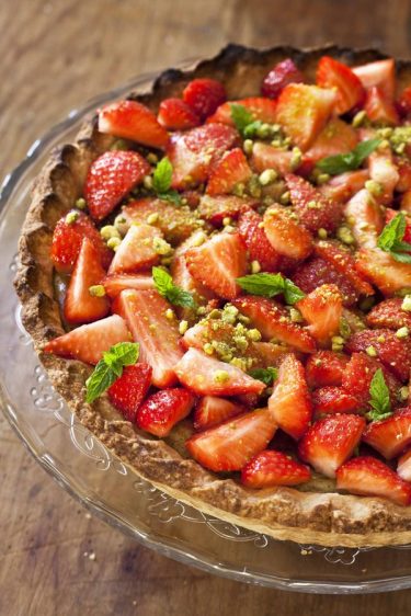 Recette de la tarte cheesecake aux fraises et aux pistaches
